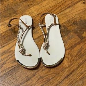 Women’s cream sandals with golden accents